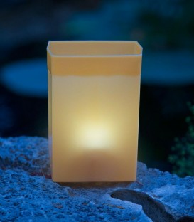 Individual Brown Luminary lit with candle