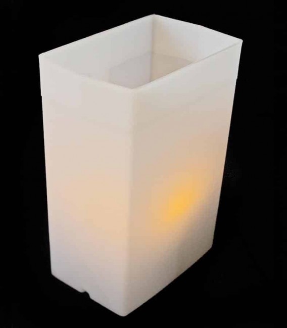 White Luminary with amber LED Tealight inside